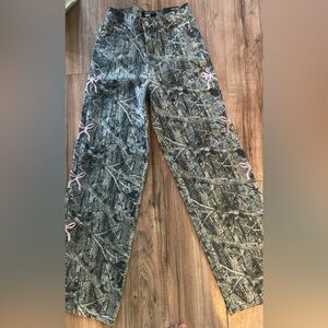 Camouflage Pants with Pink Bow Accents
By Madden NYC ultra 90’s size 00 NWT